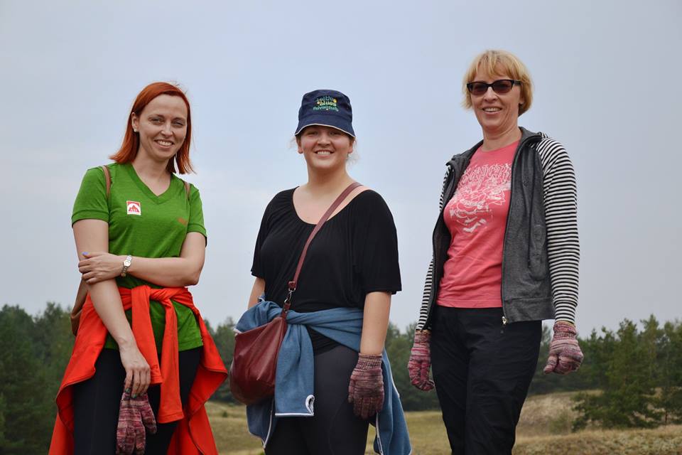 Three Baltic Blues colleagues in work gloves during a planting day
